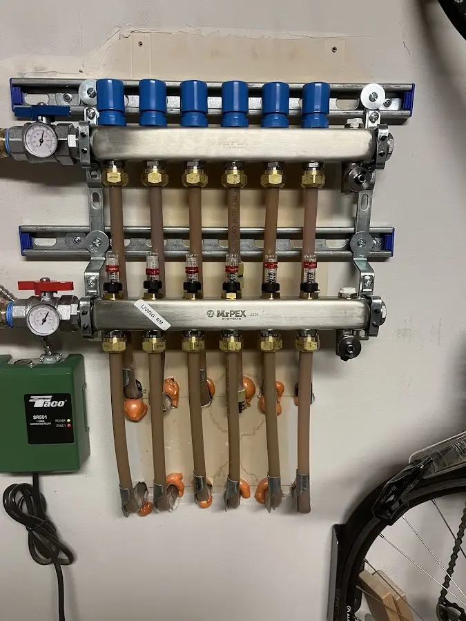 Plumber performing Gas Leak Detection at a residential property in Wilbraham